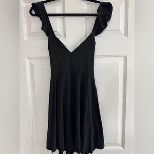Lulus black ruffle sleeve mini dress. Size small. Never worn worn.